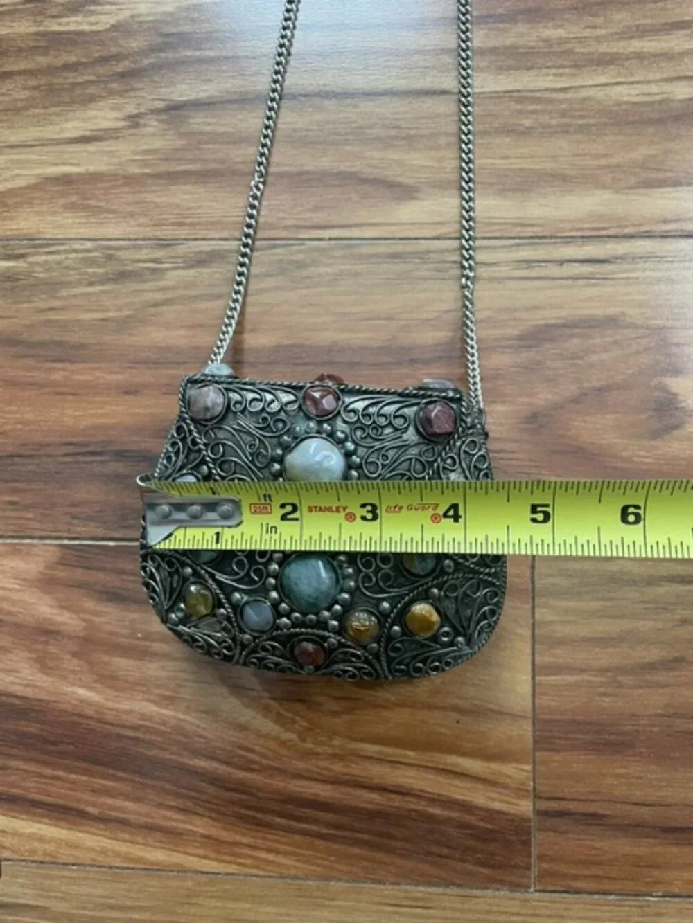 The Vintage Sajai Filigree Metal Purse with Agate Stones is a handcrafted piece